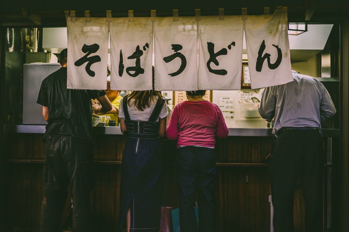 Standing Japanese soba udon noodle shop
