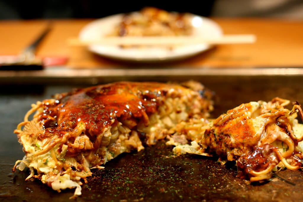 Okonomiyaki. You Have To Eat These Dishes in Osaka, by Boutique Japan.