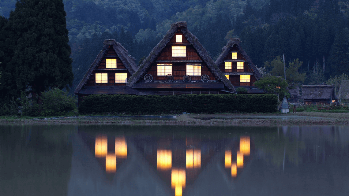 A Gassho-zukuri style farmhouse in summer at night in Shirakawago, Gifu Prefecture, Japan